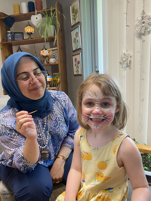 Student having her face painted