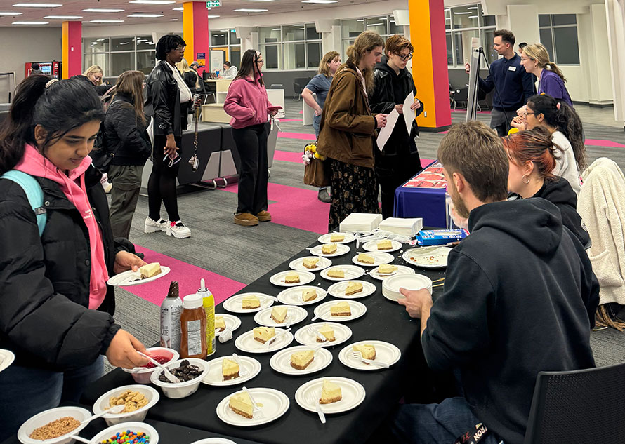 Laurier Brantford students line up for cheesecake at Say Cheese for Success