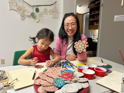 Family making ornaments 